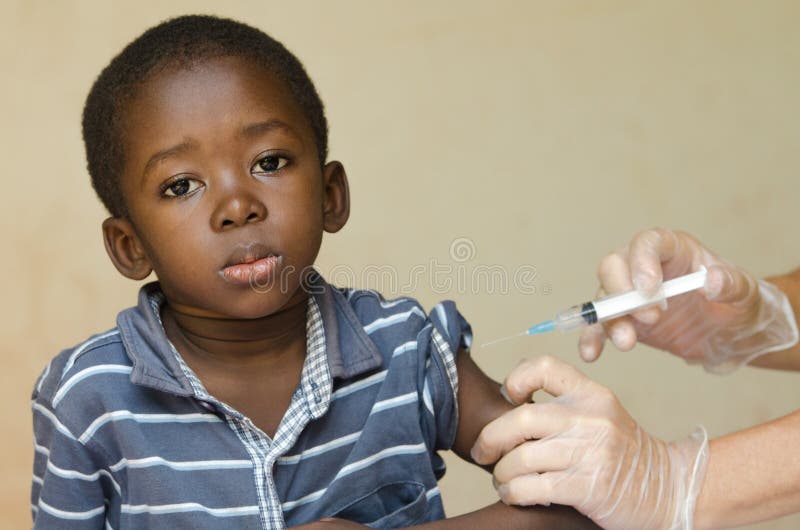 Polio Vaccination for African children from white volunteers in Africa stock image Polio Vaccination for African children from white volunteers in Africa stock image