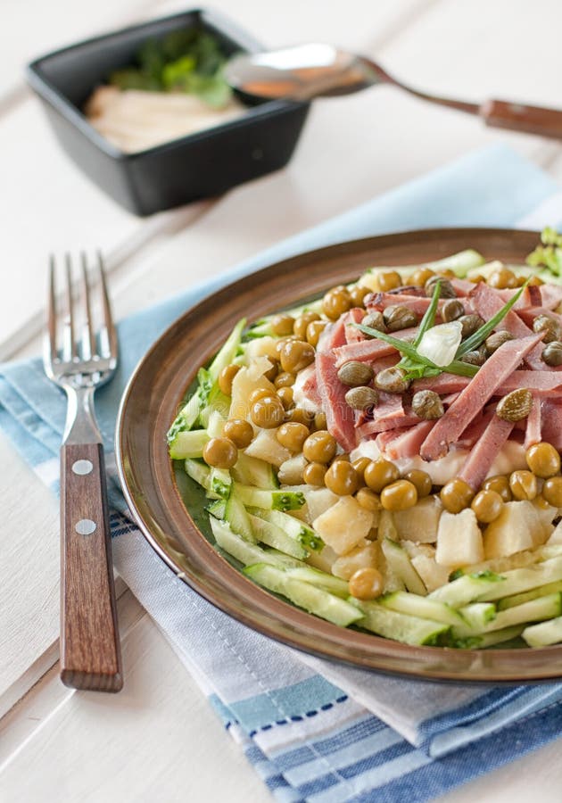 Polish salad with vegetables and capers royalty free stock photo Polish salad with vegetables and capers royalty free stock photo