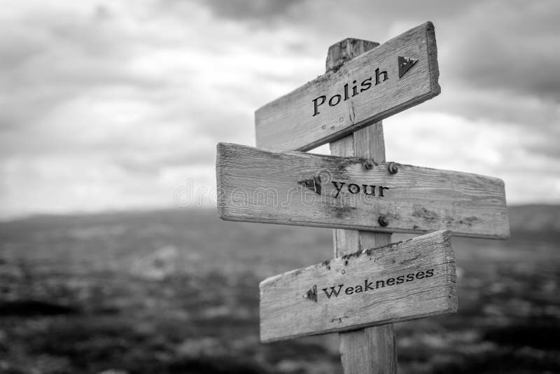 Polish your weaknesses text quote on wooden signpost