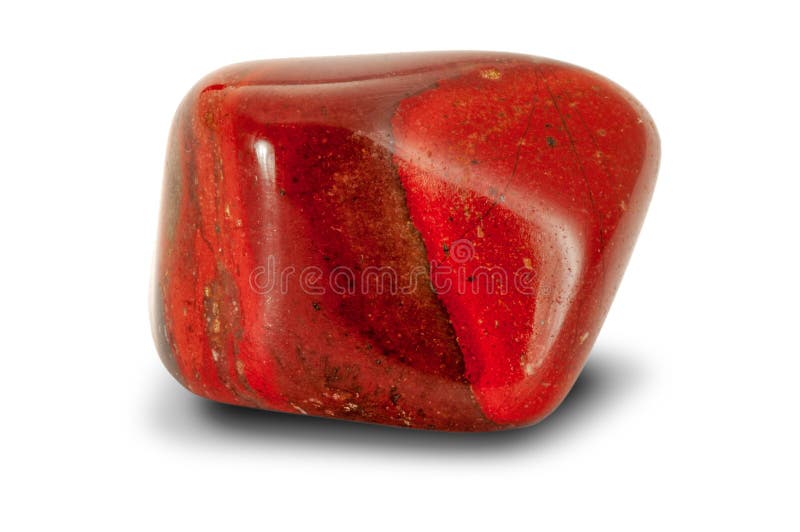 Polished red rainbow jasper gemstone, isolated on white background. Macro shot.