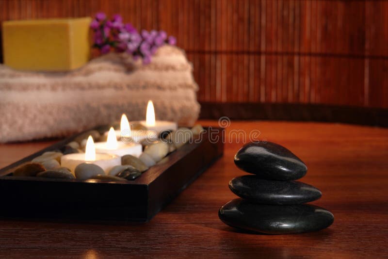 Polished Stone Cairn and Candles in Relaxation Spa stock photos Polished Stone Cairn and Candles in Relaxation Spa stock photos