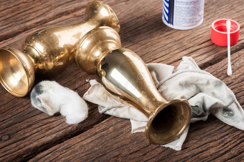 Polishing a Brass Bell stock photo. Image of signal, strike 30553774