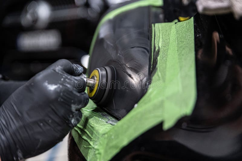 Polishing and Restoration of Car Headlights. Stock Photo Image of