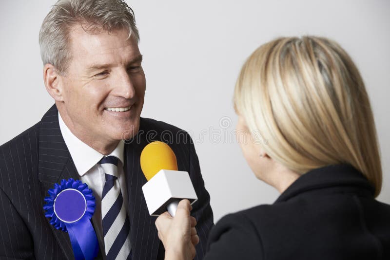 Politician Being Interviewed By Journalist During Election