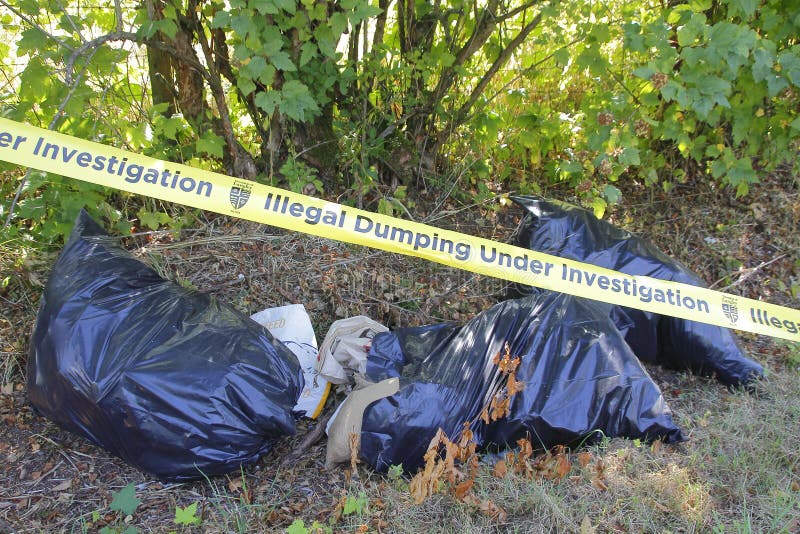 The district of Langley, BC uses police tape in an effort to deter people from illegally dumping garbage on August 4, 2016. The district of Langley, BC uses police tape in an effort to deter people from illegally dumping garbage on August 4, 2016.