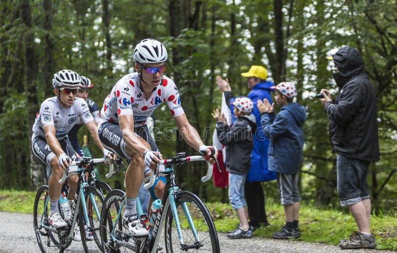 Polka Dot Jersey et débardeur blanc dans l'action photographie stock Polka Dot Jersey et débardeur blanc dans l'action photographie stock