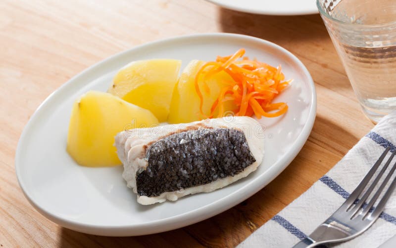 Pollock Prepared on Steam, Served with Boiled Potatoes and Carrots
