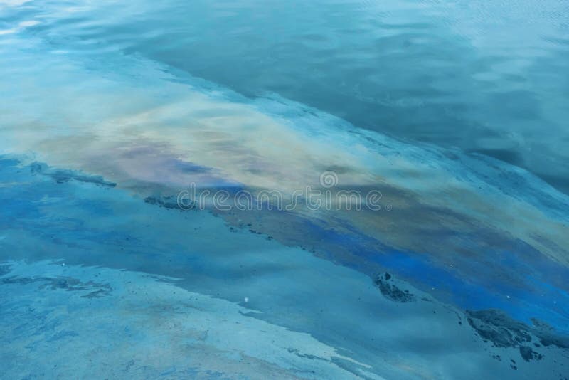 Oil spill in water stock photo. Image of gasoiline, industry 120974962