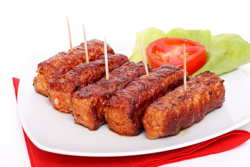 Polpettoni rumeni cotti - mititei, mici immagini stock libere da diritti Polpettoni rumeni cotti - mititei, mici immagini stock libere da diritti