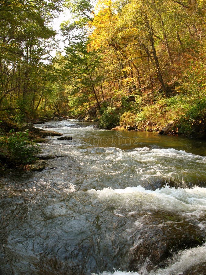 Photo of the Gunpowder river during October. This river is located new Baltimore Maryland and is popular with kayakers, rafters and fishermen. Photo of the Gunpowder river during October. This river is located new Baltimore Maryland and is popular with kayakers, rafters and fishermen.