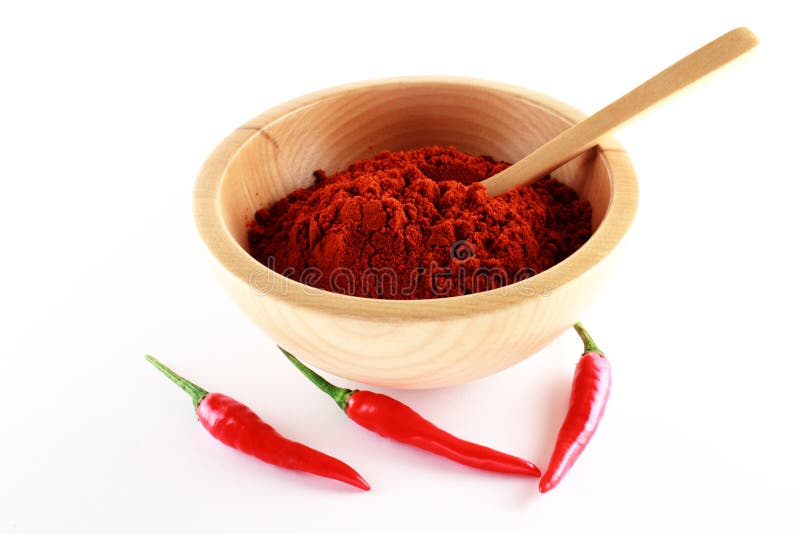 Polvo de Parika y chile de tres rojos fotografía de archivo