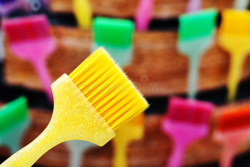 Polymer brushes for hair coloring. Hairdresser tools trade. Foreground