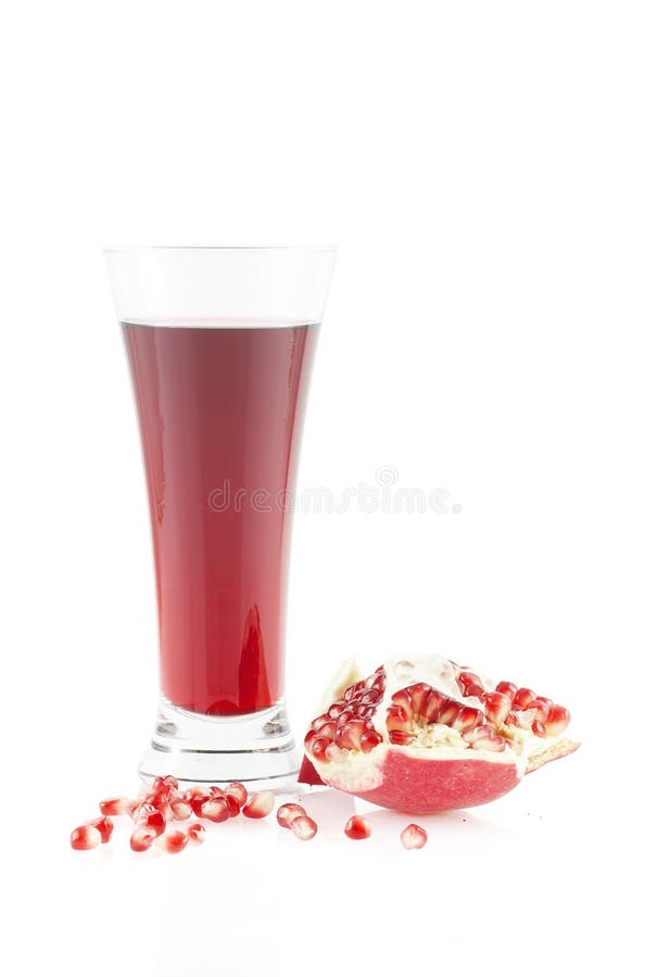 Pomegranate juice, grains and a pomegranate piece.