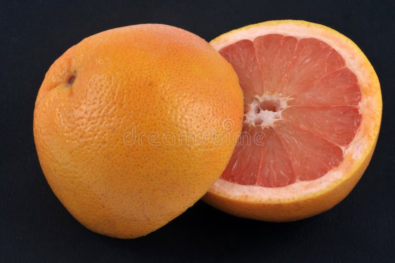 Pomelo Cut in Closeup on Black Background Stock Photo Image of