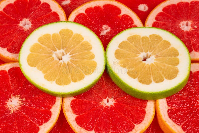 Pomelo And Grapefruit Slices Background Stock Photo Image of round
