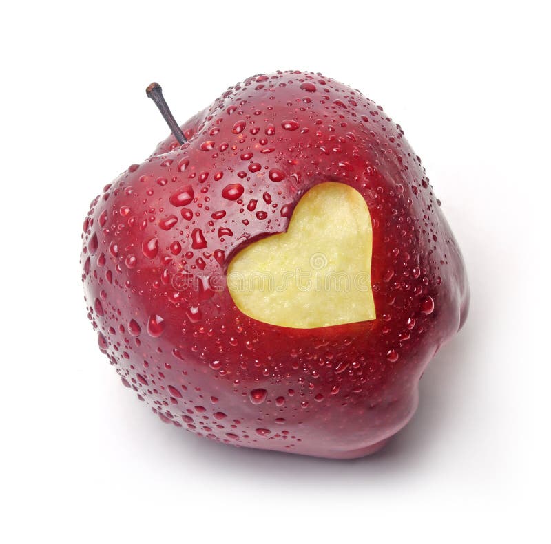 Pomme rouge avec un symbole de coeur photo libre de droits Pomme rouge avec un symbole de coeur photo libre de droits