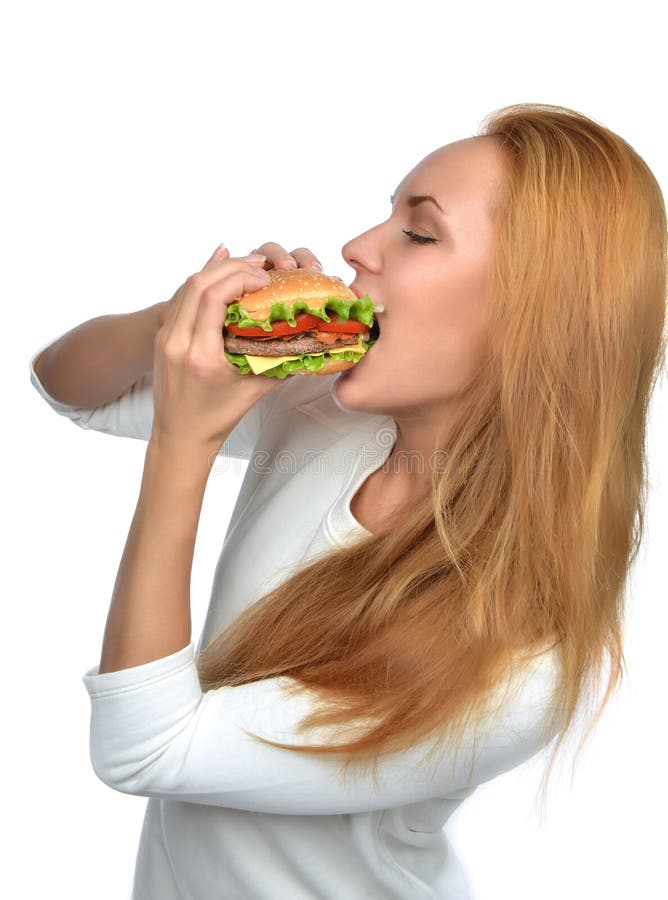 Pommes-Frites, Burger- und Ketschupherz Frau, die geschmackvolles ungesundes Burgersandwich isst stockfoto Pommes-Frites, Burger- und Ketschupherz Frau, die geschmackvolles ungesundes Burgersandwich isst stockfoto