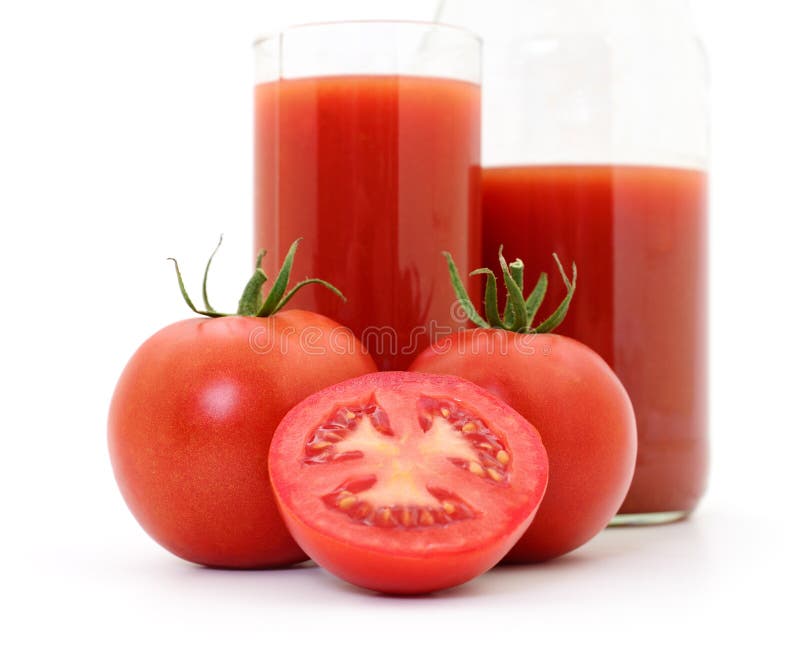 Pomodori e succo di pomodoro immagine stock libera da diritti Pomodori e succo di pomodoro immagine stock libera da diritti