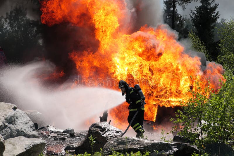 Fireman in Sweden fighting fire. Fireman in Sweden fighting fire.
