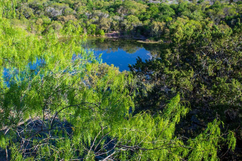 View of Inks Lake with Budding Trees in the Beautiful Texas Hill