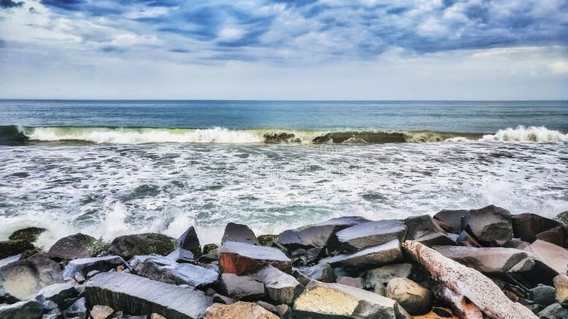 Pondicherry Rock Beach Front View Sea Waves And Skyline Stock Photo pondicherry-rock-beach-front-view-sea-waves-and-skyline-stock-photo
