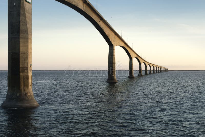 Confederation Bridge over sunset sky, Northumberland Strait, Prince Edward Island, Canada. Confederation Bridge over sunset sky, Northumberland Strait, Prince Edward Island, Canada.