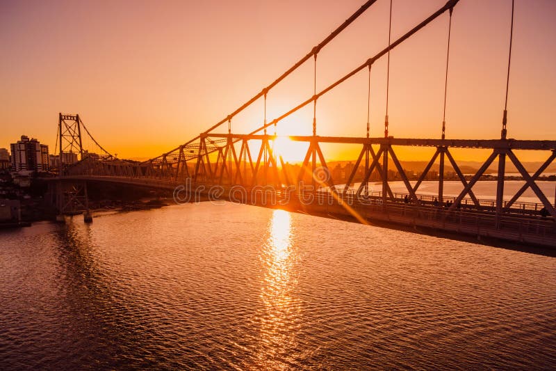 Hercilio luz cable bridge with sunset light in Florianopolis. Aerial view. Hercilio luz cable bridge with sunset light in Florianopolis. Aerial view