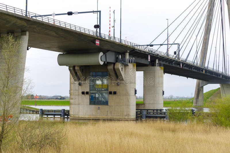 Island bridge (Eiland brug in Dutch language). It is a cable-stayed bridge with a underpass of 14 m. Island bridge (Eiland brug in Dutch language). It is a cable-stayed bridge with a underpass of 14 m