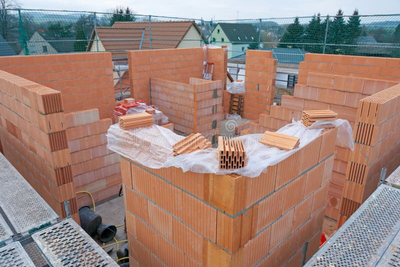 A scaffolded single-family house under construction. A scaffolded single-family house under construction