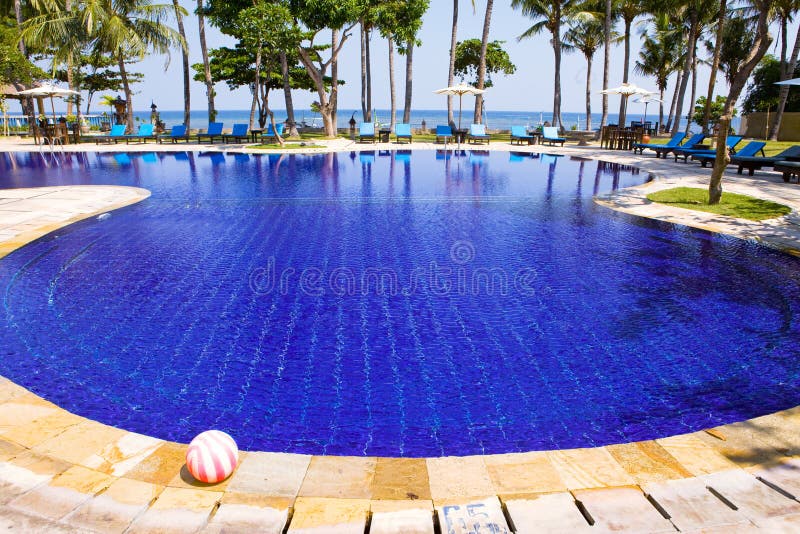 Pool, ocean, palm trees . Indonesia. Bali. stock image Pool, ocean, palm trees . Indonesia. Bali. stock image