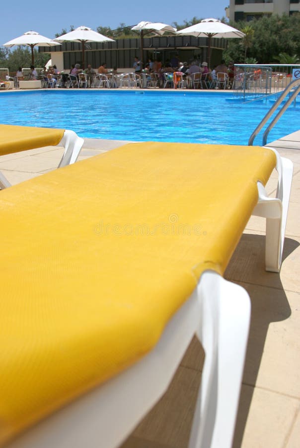 Pool sunbeds closeup stock image. Image of colorful, blue 2928895