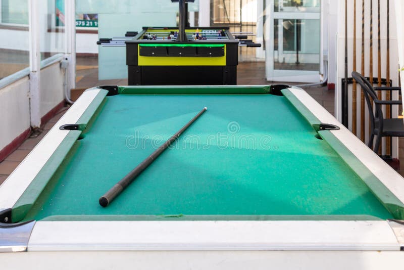 Pool Table with a Cue and No Balls in a Room Stock Photo Image of