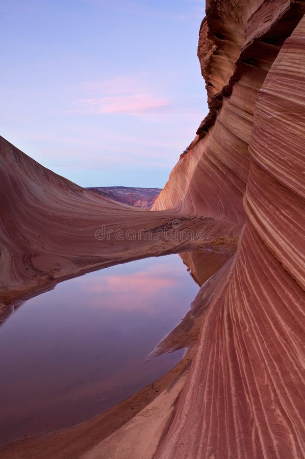 Pool of Water and Sandstone Entrance