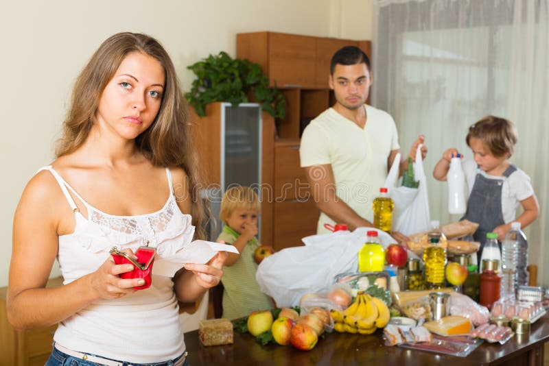 Poor Family with Bags of Food Stock Image - Image of children, indoor