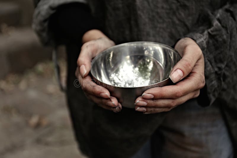 Poor homeless woman with empty bowl, closeup royalty free stock images