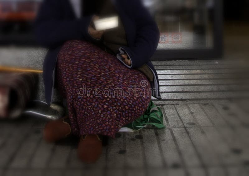 Poor woman alms stock images Poor woman alms stock images