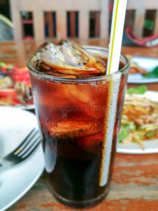 Pop or Cola Water in Glass on the Wooden Table. Stock Photo Image of