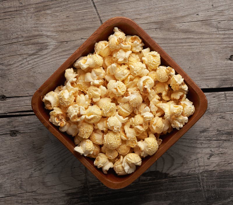 Popcorn in a Bowl on Wooden Table Stock Image Image of sweet, table
