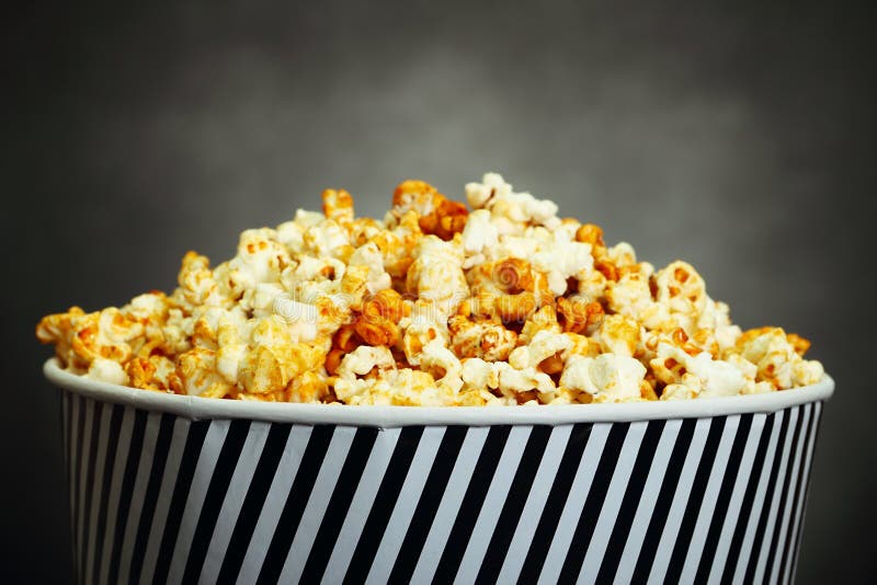 Boy with popcorn stock image. Image of monochrome, youth 23929539