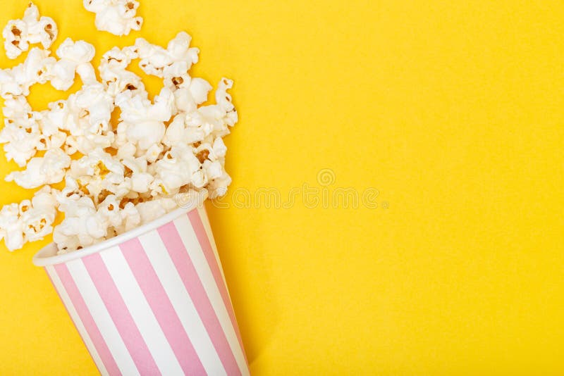 Download Popcorn Bucket And Film Strip On Yellow Background Stock Photo Image Of Broadcasting Container 178672036 Yellowimages Mockups