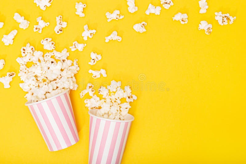 Download Popcorn Bucket And Film Strip On Yellow Background Stock Photo Image Of Broadcasting Container 178672036 Yellowimages Mockups