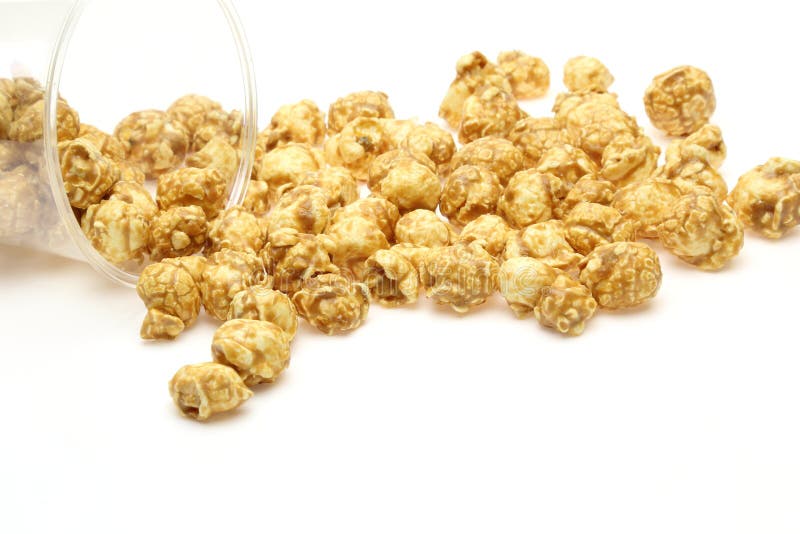 Popcorn Combined with Caramel Syrup in a Plastic Cup Stock Photo