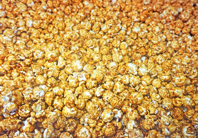 Popcorn Pattern. Caramel popcorn background stock photos Popcorn Pattern. Caramel popcorn background stock photos
