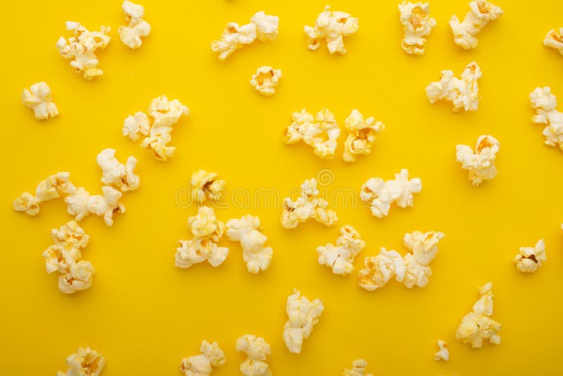 Popcorn pattern, texture on a yellow background. Top view, entertainment, movie royalty free stock images Popcorn pattern, texture on a yellow background. Top view, entertainment, movie royalty free stock images