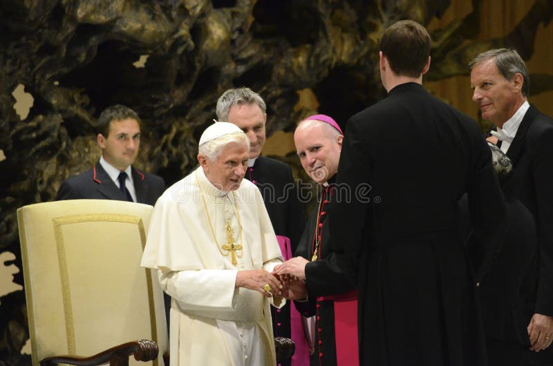 Pope Benedict greets Archbishop Aquila