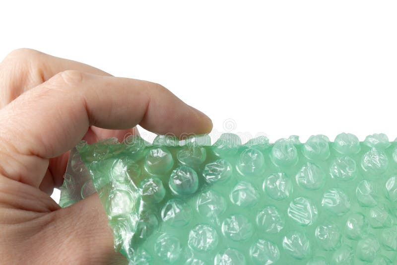 Bubble wrap in a fingers stock photo. Image of parcel 204566810