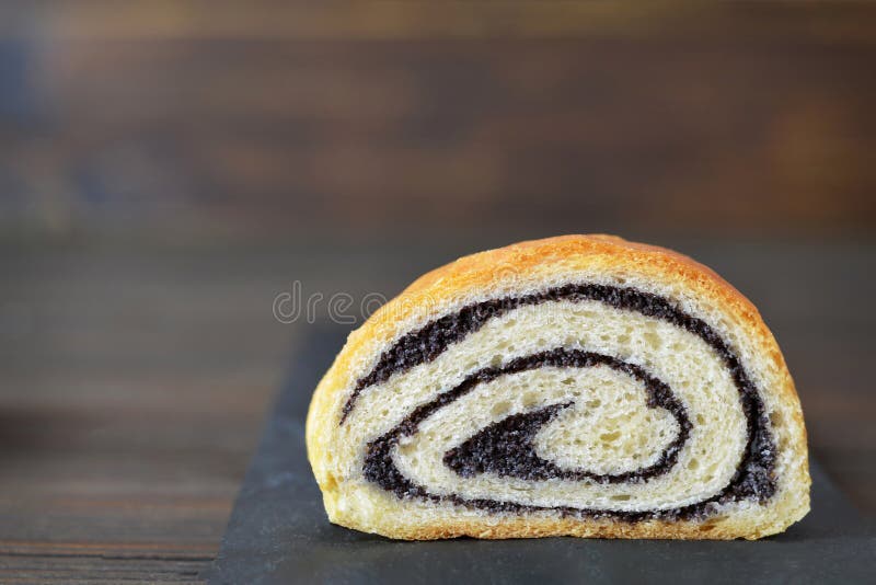 Poppy seed roll stock photo. Image of loaf, board, food 118908400