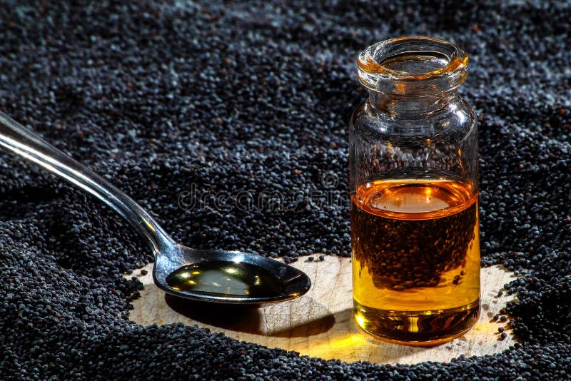 Poppy seeds oil stock photo. Image of cuisine, material 86555184
