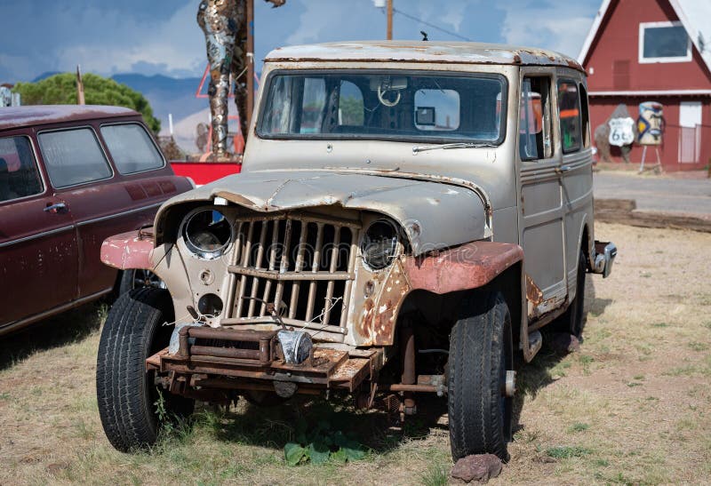 A Former SUV Willys Jeep Station Wagon is damaged in the front with a blow to the radiator grill. A Former SUV Willys Jeep Station Wagon is damaged in the front with a blow to the radiator grill