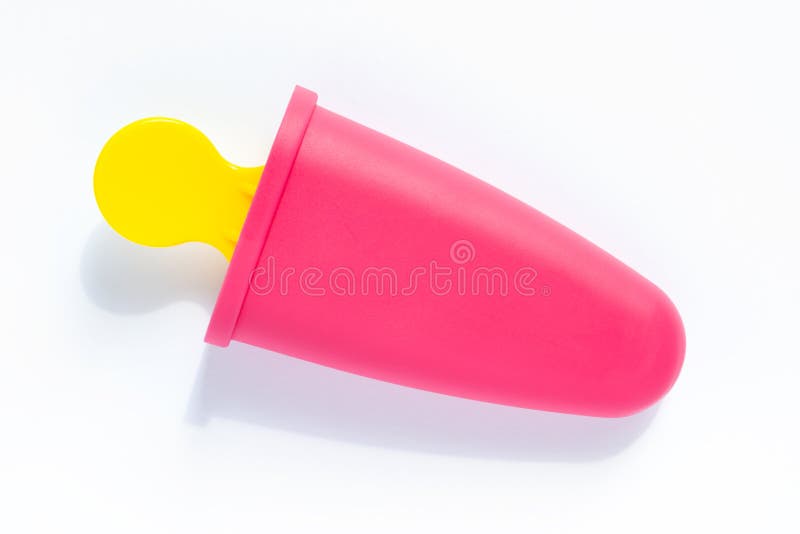 A single magenta and yellow popsicle mold on a white background